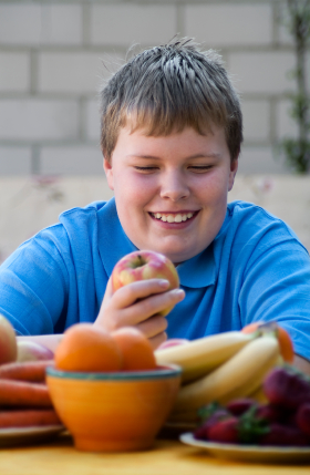 boy eating fruit